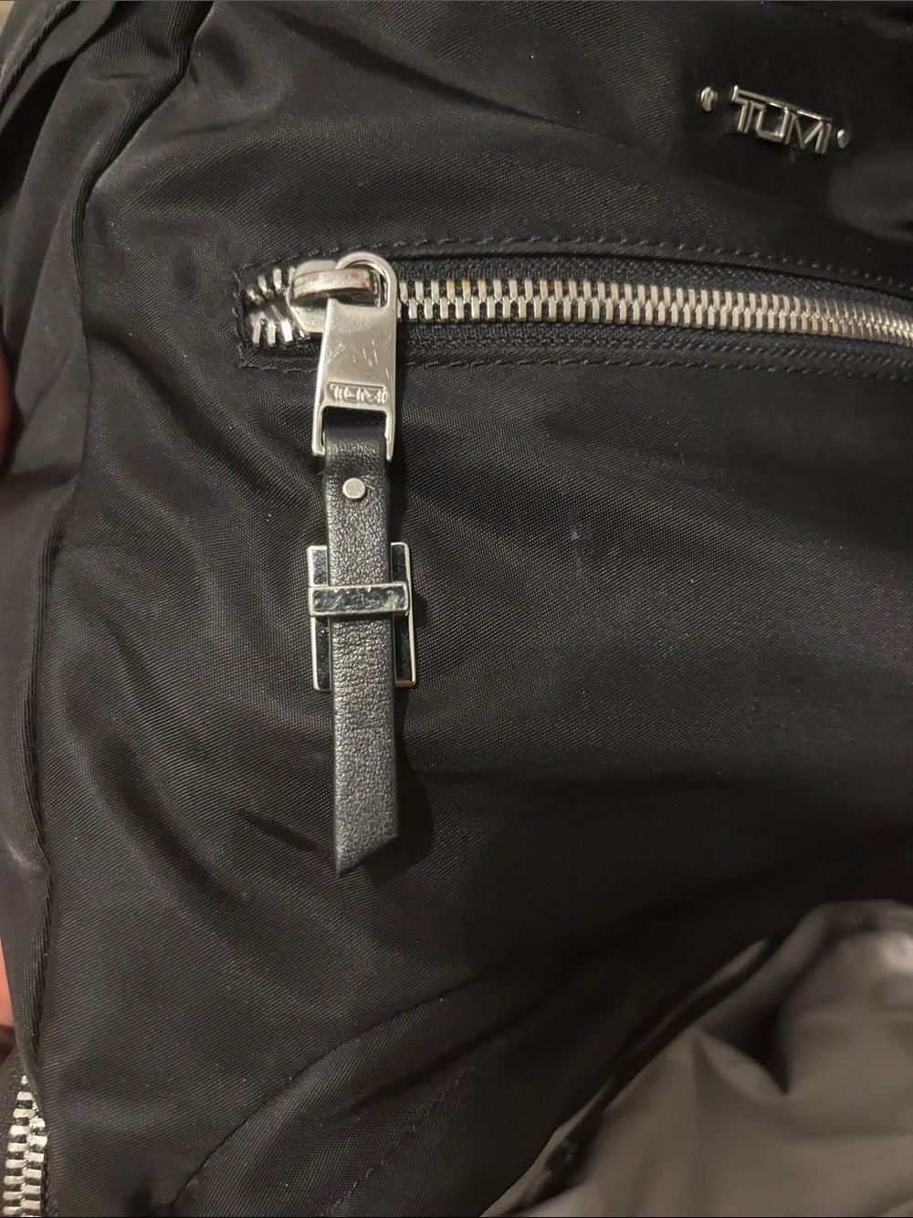 Tumi Black Nylon Backpack with Front Zip Pockets